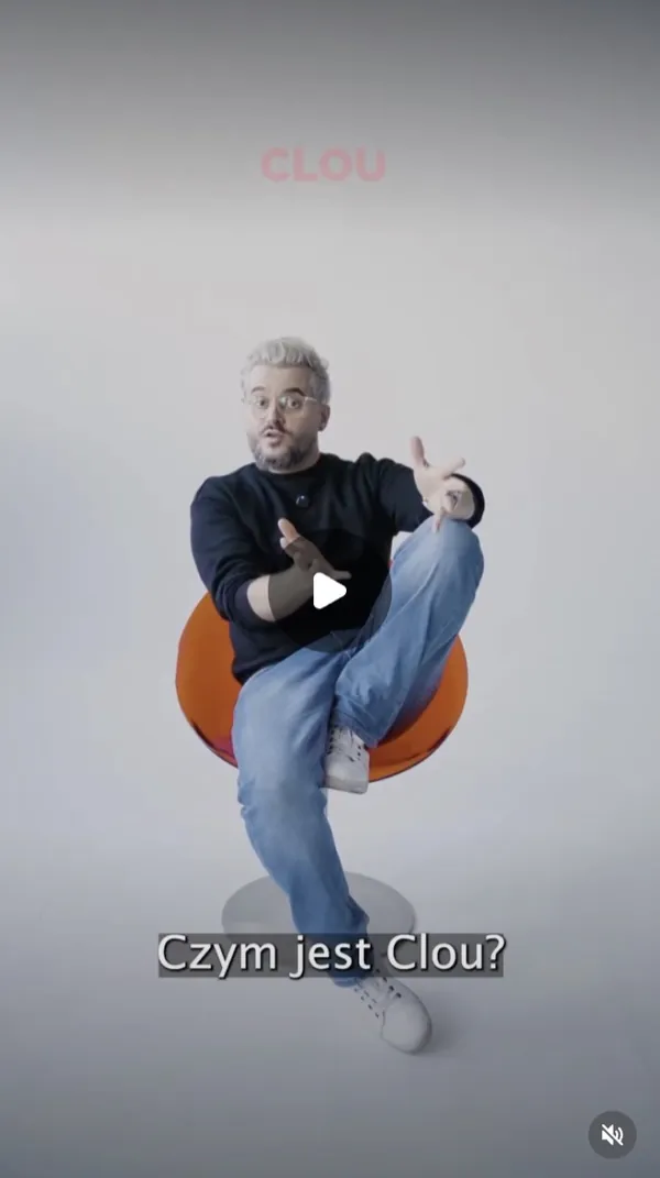 Reel: a man in glasses sits on an orange chair and gestures, subtitle “Czym jest Clou?” (What is Clou?)