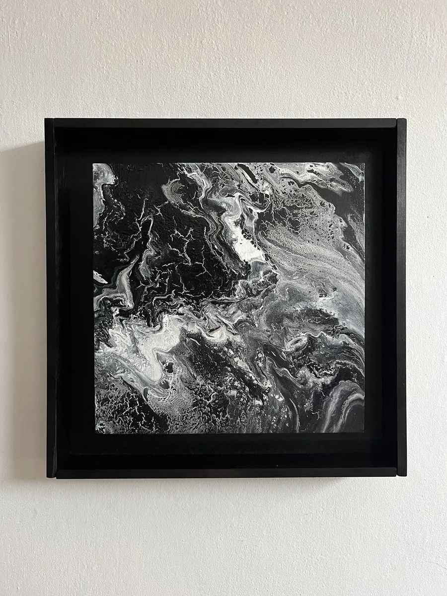 TERRA I, acrylic on board, 30x30 cm — black-and-white marbled pattern in a deep black frame